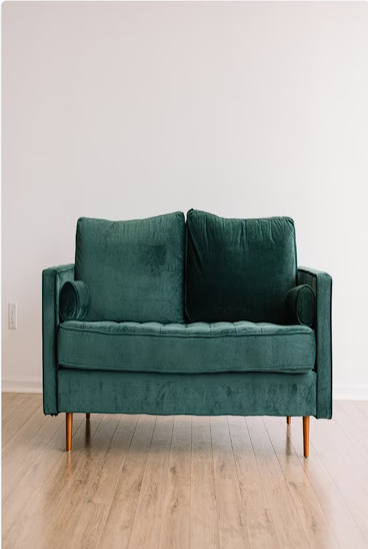 Cozy wool blanket draped over a sofa