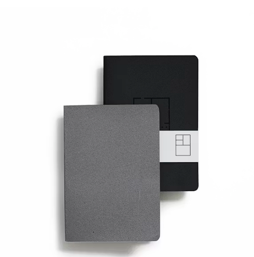 Open notebook with pen on a desk