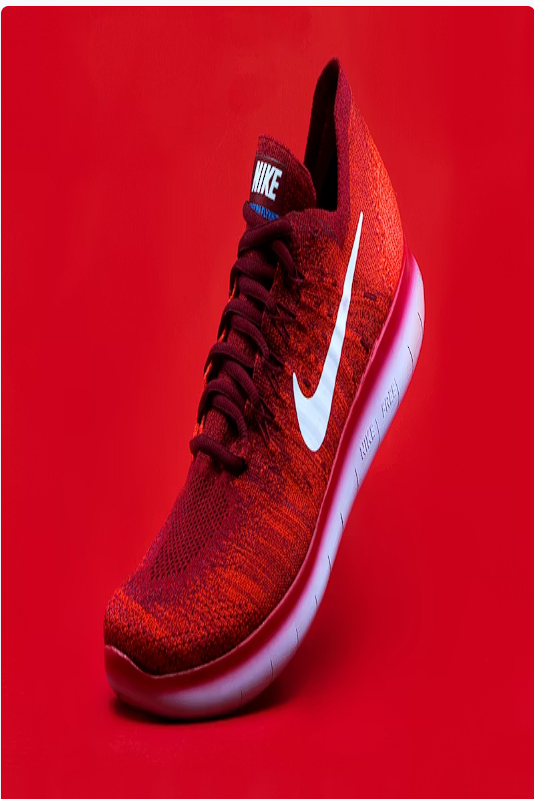 Red athletic running shoe