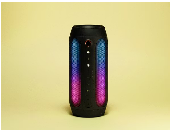 Compact bluetooth speaker on a shelf